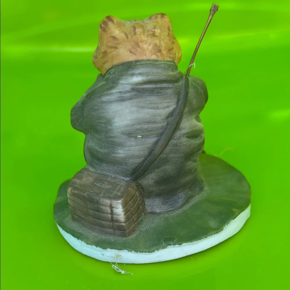 Vintage Reptile Figurine with Fishing Rod